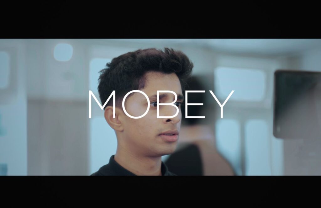 Kris Badane in a still from Mobey